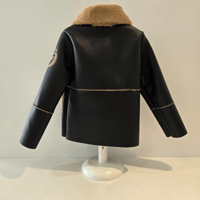 Pelliza niño negro y camel exteriores Noma Fernández invierno - Imagen 3